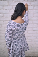 Load image into Gallery viewer, Elegant Black & White Floral Printed Peplum Top with Full Sleeves
