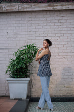 Load image into Gallery viewer, Blue printed sleeveless spaghetti strap top with white leaf-like patterns