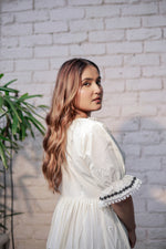 Load image into Gallery viewer, Women's Ivory White Cotton Dress with Black Lace V-Neck, Puff Sleeves, Embroidered Detailing & Flared Fit – Elegant Casual & Semi-Formal Wear