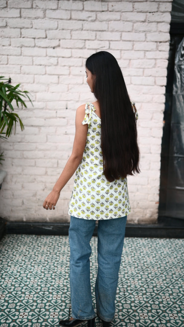 Summer Vibes White slaveless Spaghetti Top with Yellow flower like petals