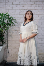 Load image into Gallery viewer, Women&#39;s Ivory White Cotton Dress with Black Lace V-Neck, Puff Sleeves, Embroidered Detailing &amp; Flared Fit – Elegant Casual &amp; Semi-Formal Wear
