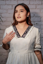Load image into Gallery viewer, Women&#39;s Ivory White Cotton Dress with Black Lace V-Neck, Puff Sleeves, Embroidered Detailing &amp; Flared Fit – Elegant Casual &amp; Semi-Formal Wear
